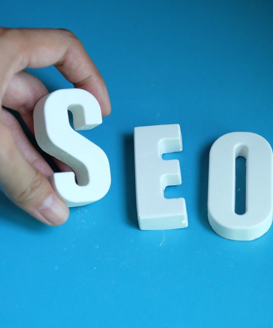 hand arrange white letters as seo scaled